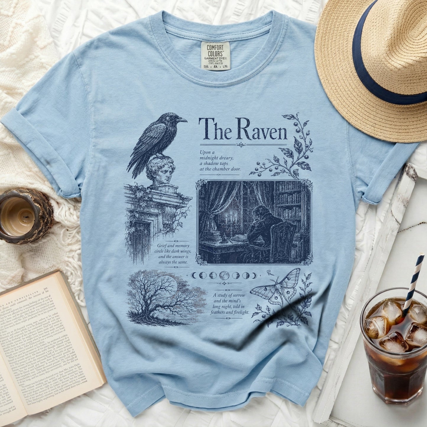 Light blue t-shirt with "The Raven" poem design and raven illustration.
