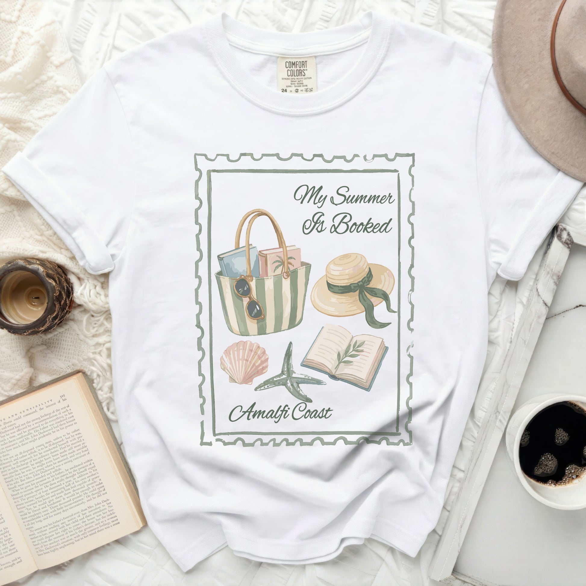 White t-shirt with "My Summer Is Booked Amalfi Coast" stamp graphic.