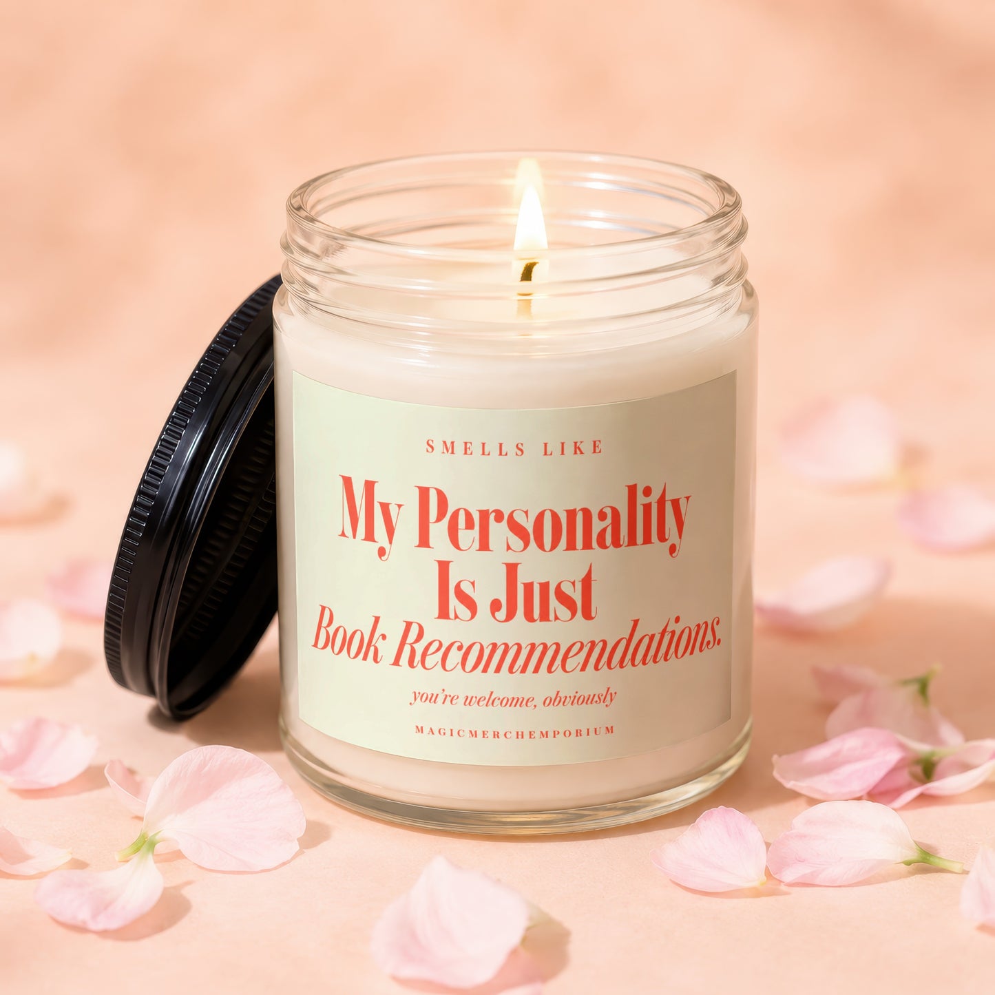 Jar candle with lit flame and the text "My Personality Is Just Book Recommendations."