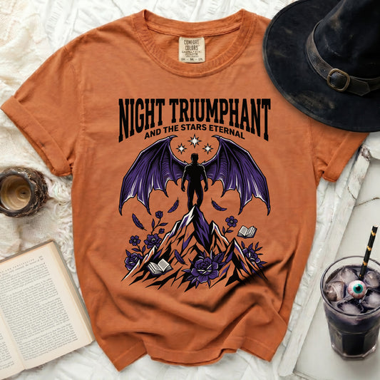 Orange t-shirt with graphic of a winged figure on a mountain, text "Night Triumphant and the Stars Eternal".