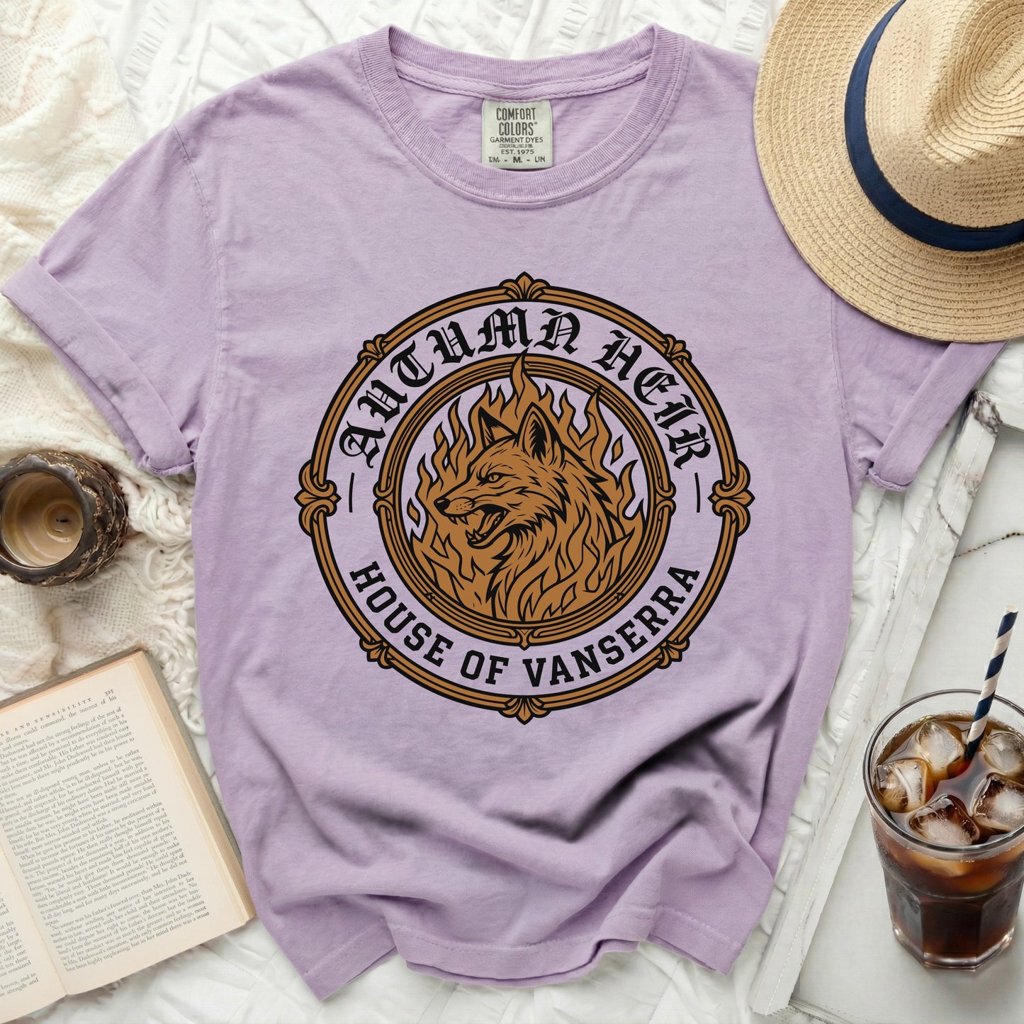 Lavender t-shirt with a circular graphic of a fiery wolf and "Autumn Heir House of Vanserra."