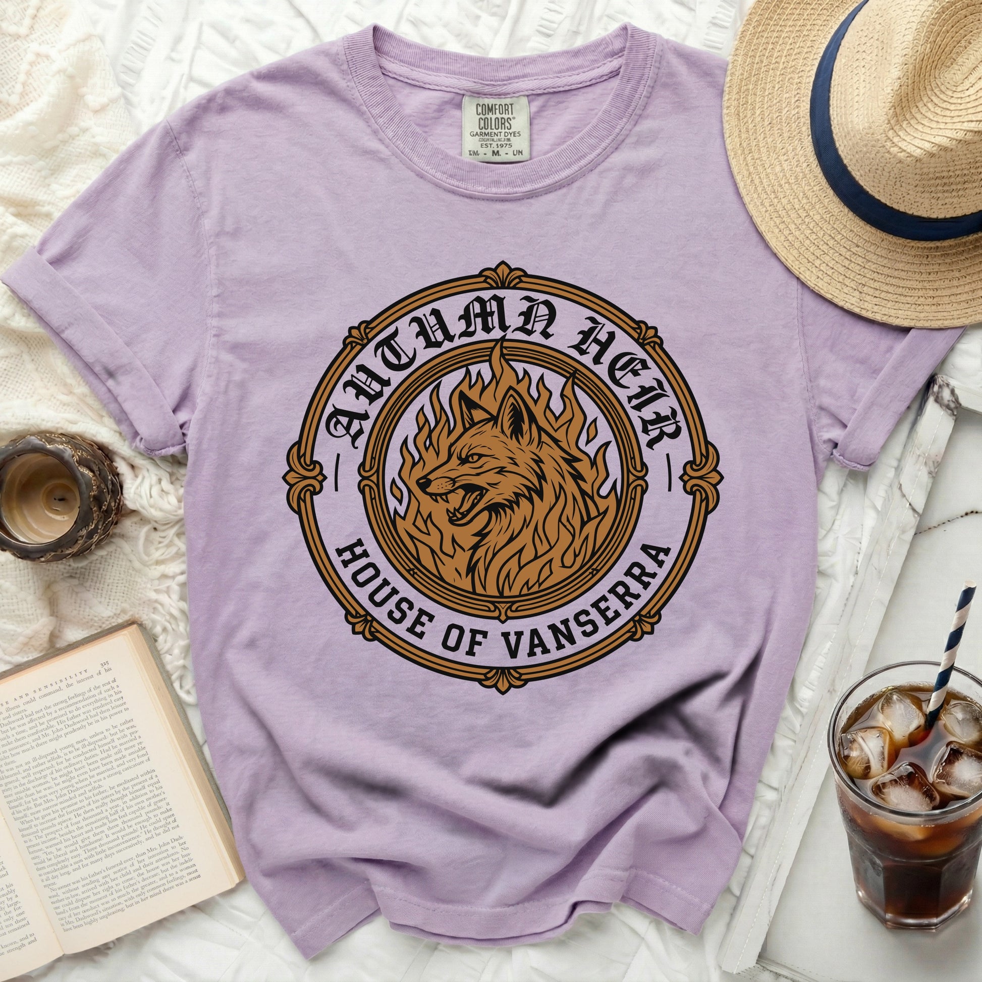 Lavender t-shirt with a circular graphic of a fiery wolf and "Autumn Heir House of Vanserra."