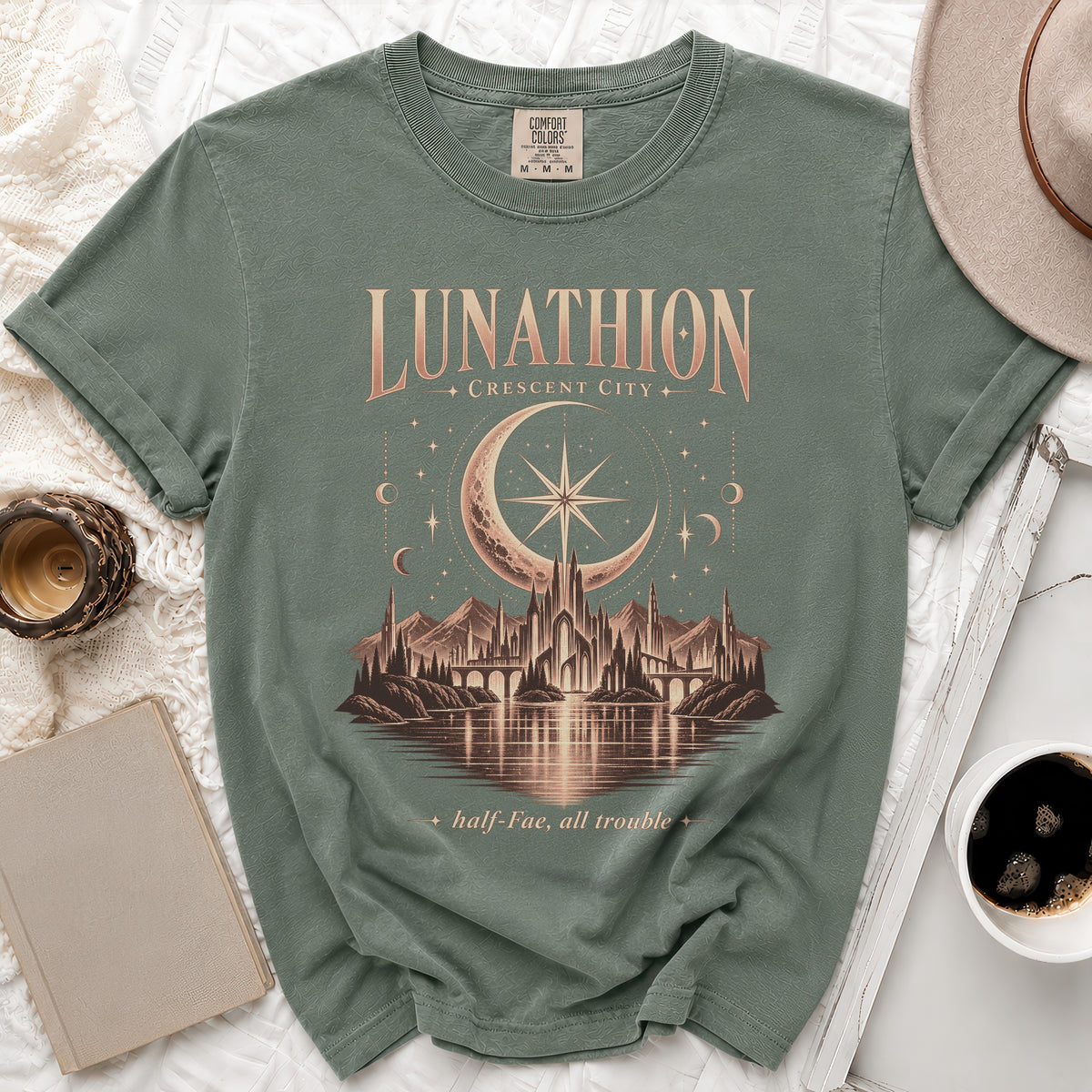 T-shirt with "Lunathion Crescent City" text over a castle and moon graphic.