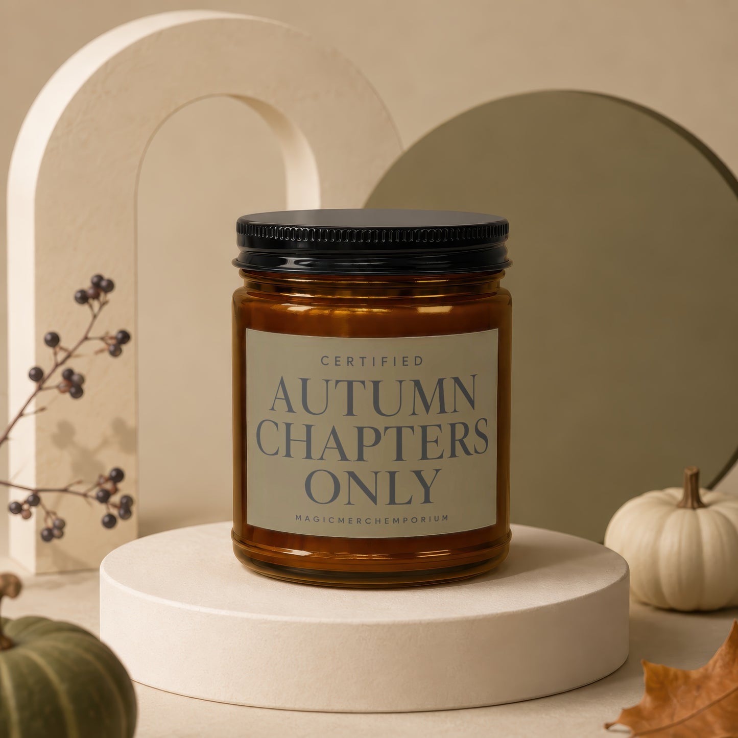 Amber candle with black lid labeled "Autumn Chapters Only".