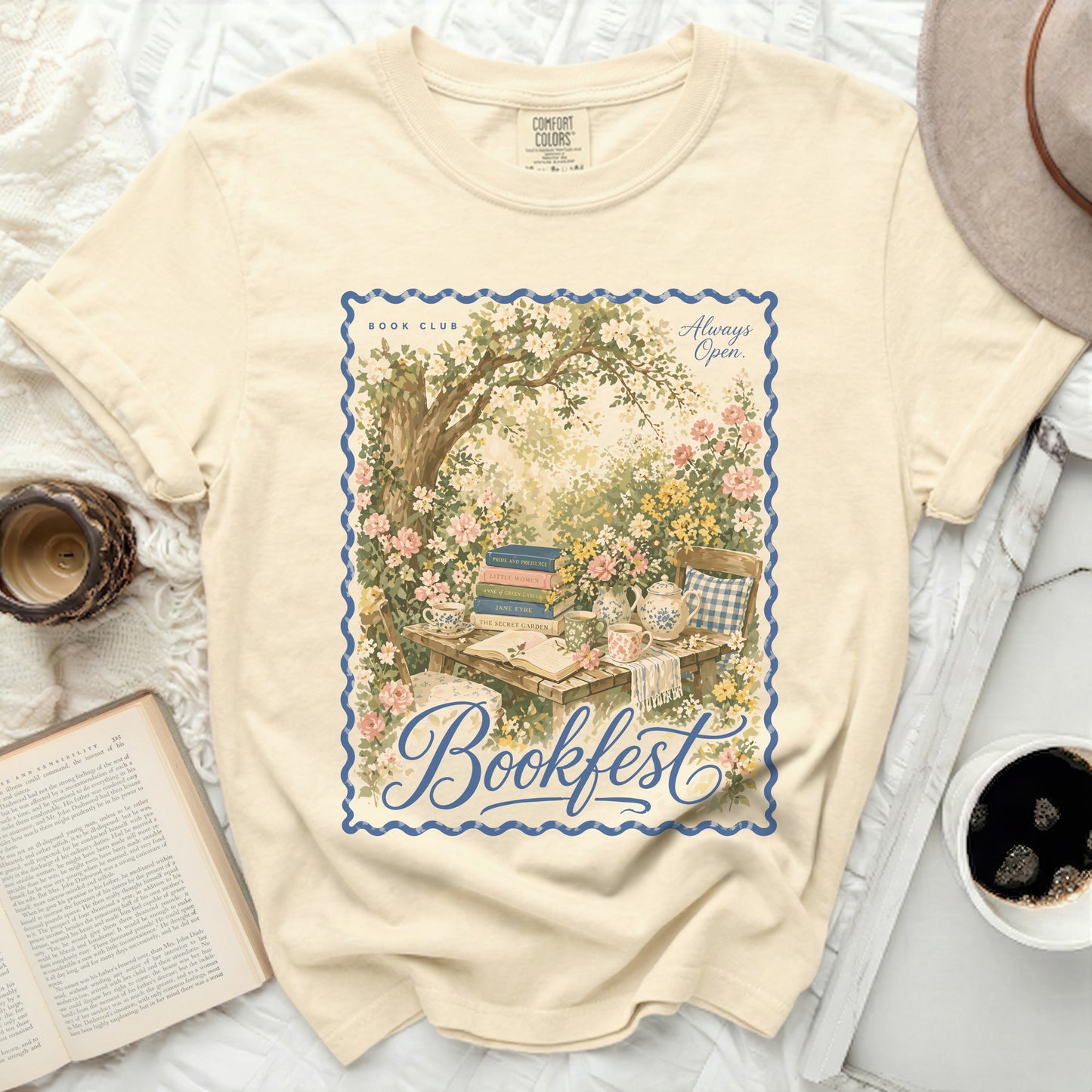 "Bookfest" graphic tee with vintage postage stamp, books, and teacups.