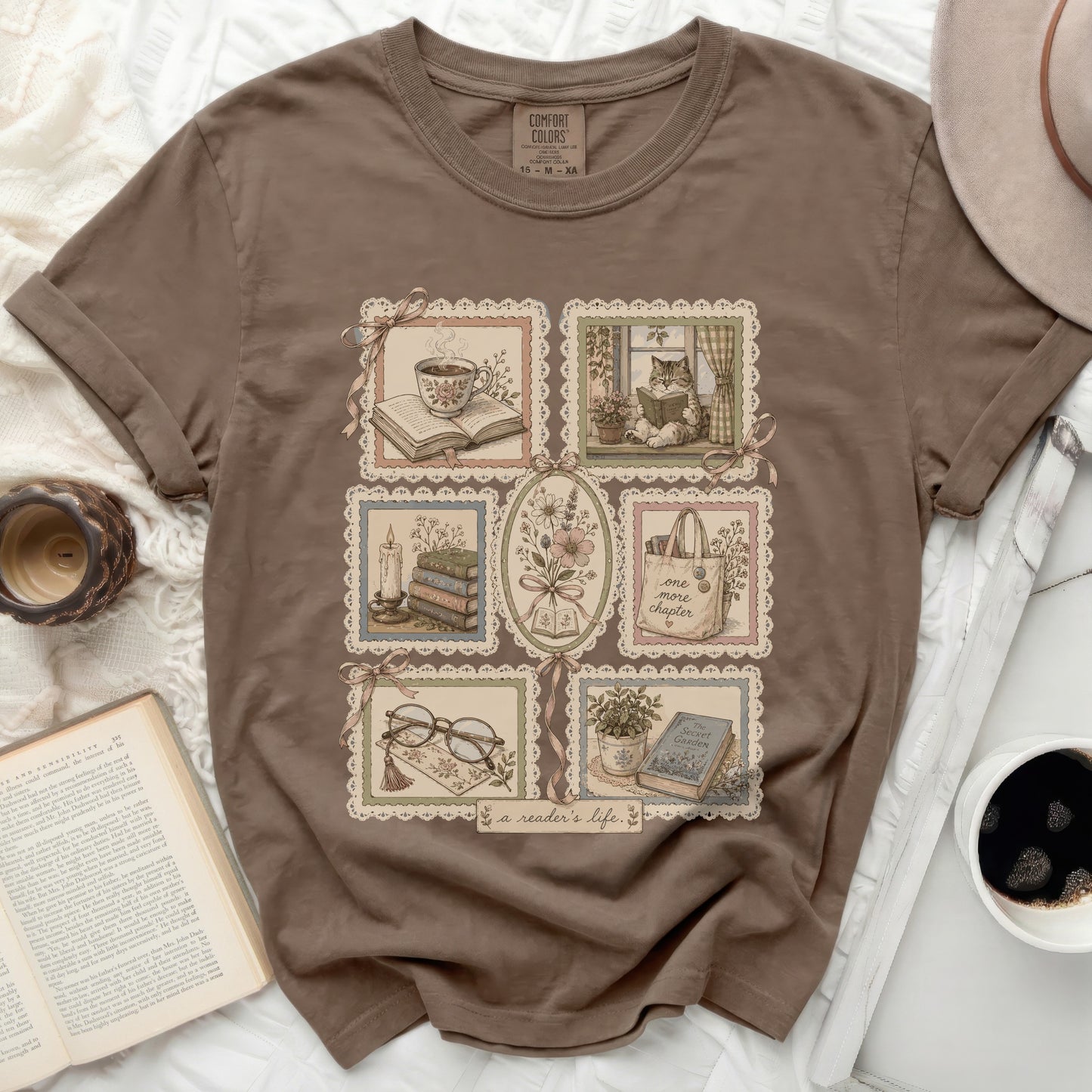 T-shirt with framed illustrations of books, tea, glasses, and a cat.