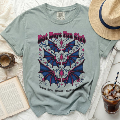 Light blue t-shirt with "Bat Boys Fan Club" and bats design.