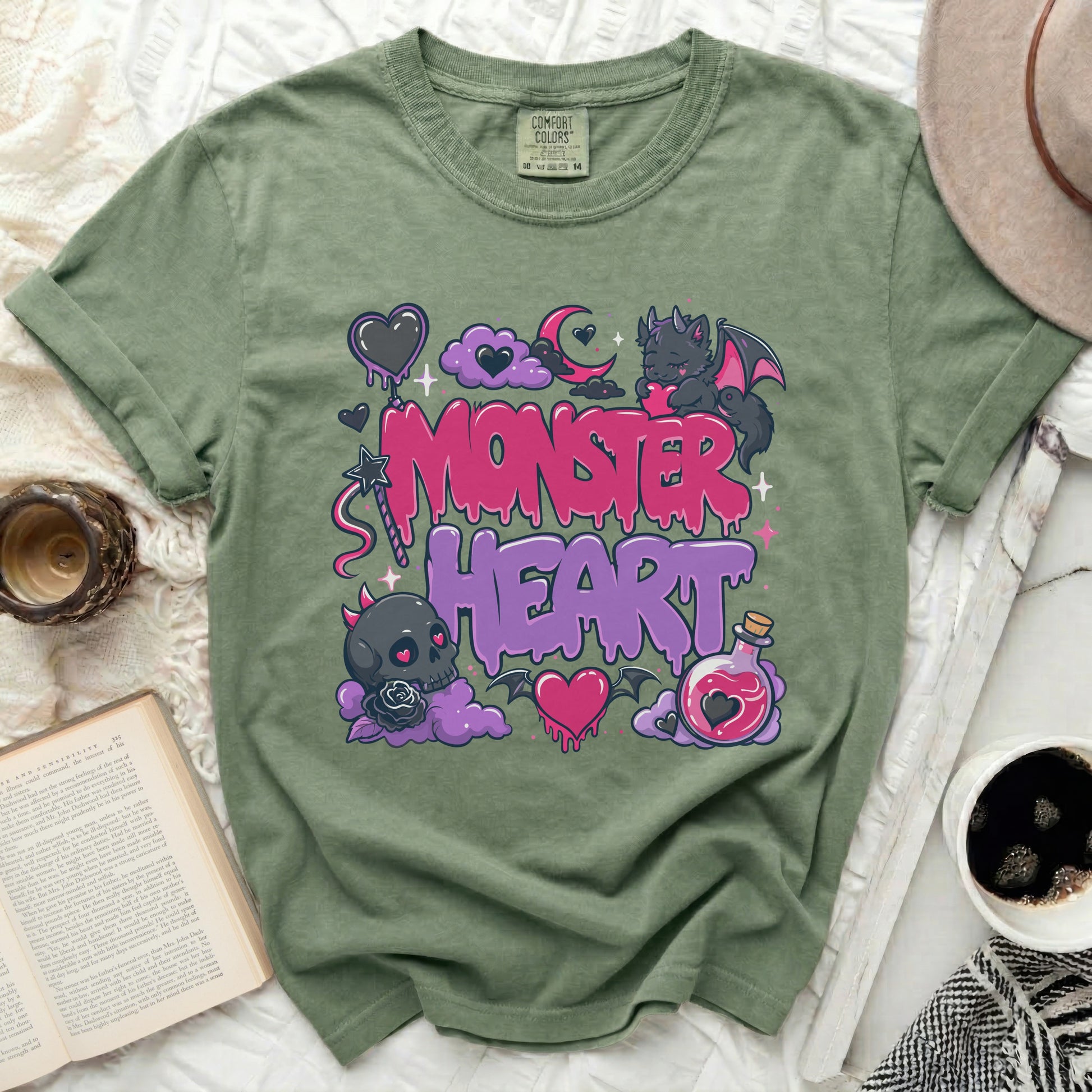 Green t-shirt with "Monster Heart" graphic, featuring a skull, bat, and potion.