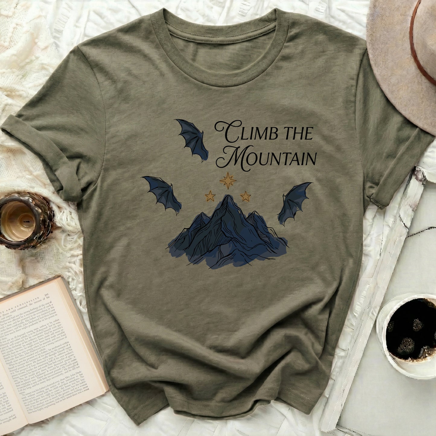 Climb The Mountain Bats Stars Design product type
Climb The Mountain,Mountain Design,Bats Graphic,Stars Theme,Mystical Print,Adventure Tee,Inspirational,Graphic Print,Unique Design,Aesthetic Top,Fantasy Apparel,Nature Theme,Challenge Shirt,Olive Green,Sage Green,Earth Tone,Everyday Fashion,Casual Wear,Dark Academia,Outdoors Vibe
