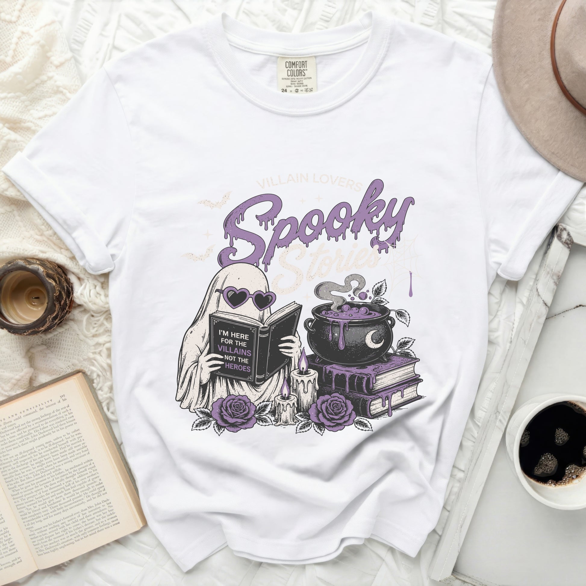 White t-shirt with "Spooky Stories" and ghost reading "I'm here for the villains not the heroes."