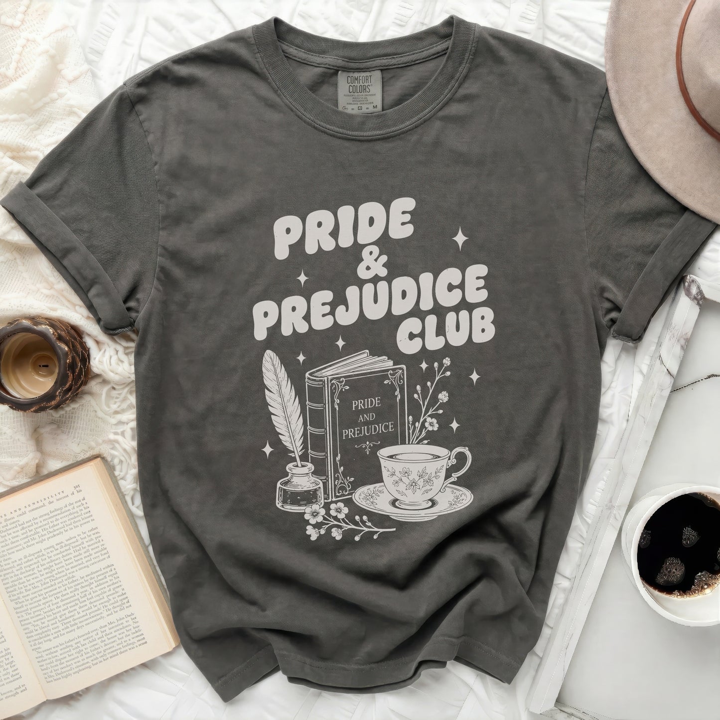 Pride and Prejudice Club graphic t-shirt with book and teacup design.