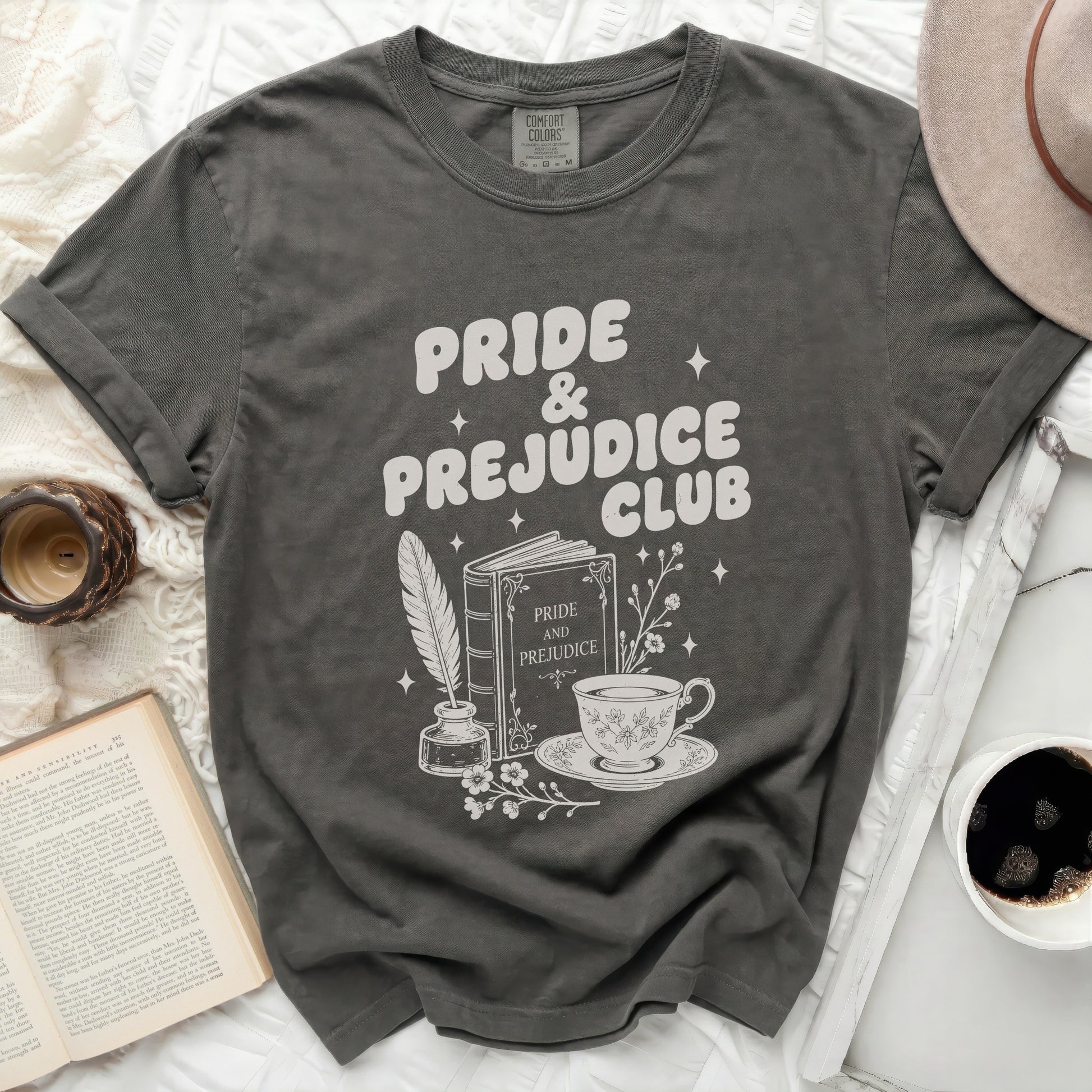 Pride and Prejudice Club graphic t-shirt with book and teacup design.