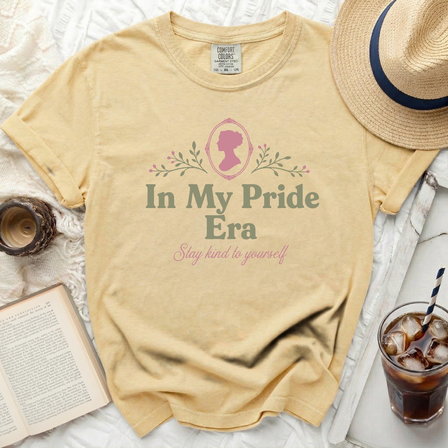Yellow t-shirt with "In My Pride Era Stay kind to yourself" text.
