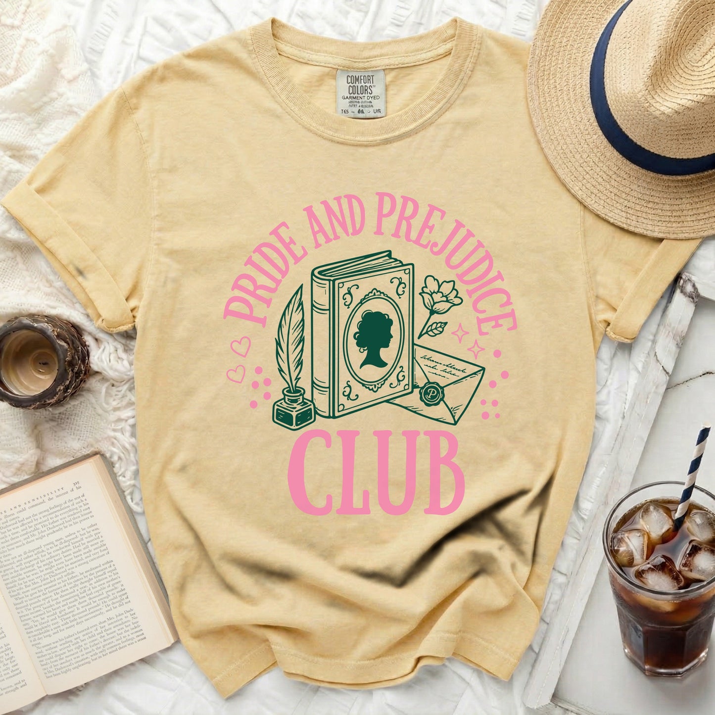 Yellow t-shirt with "Pride and Prejudice Club" book graphic.