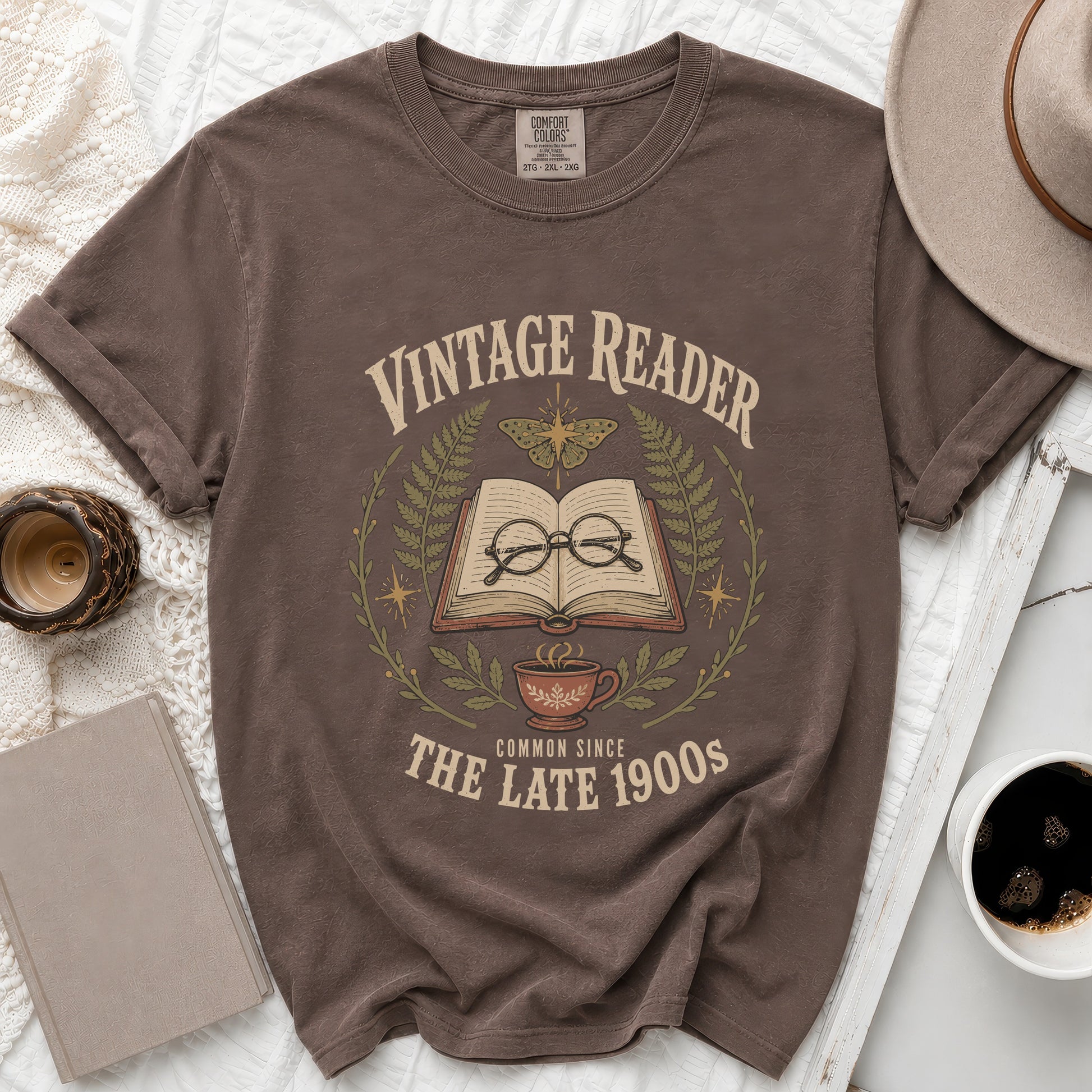Brown t-shirt with "Vintage Reader Common Since The Late 1900s" graphic.