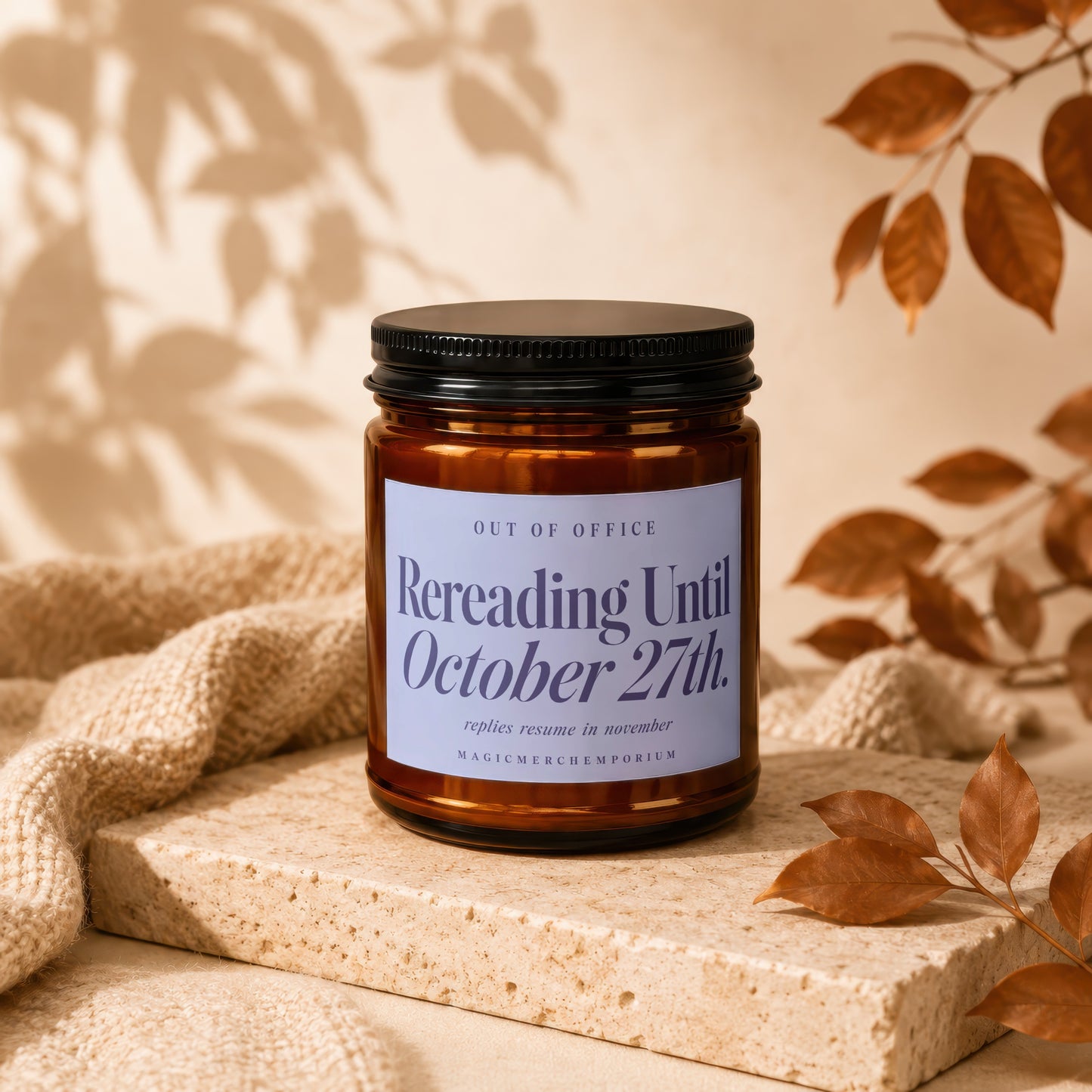 Amber jar candle with "Rereading Until October 27th" text.
