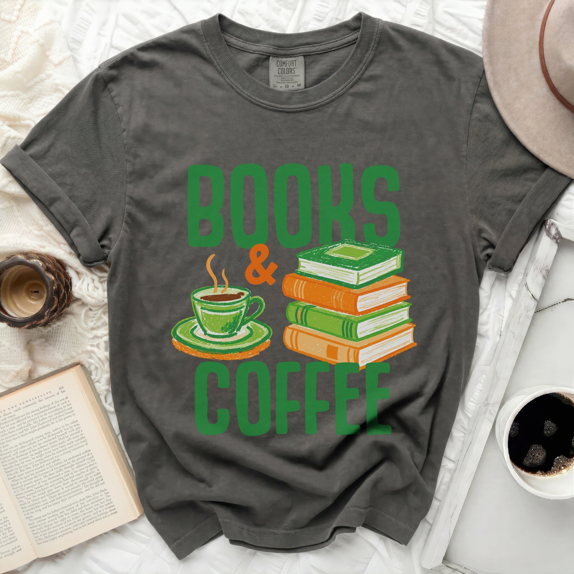 Dark gray t-shirt with green "Books & Coffee" graphic of a steaming cup and stacked books.