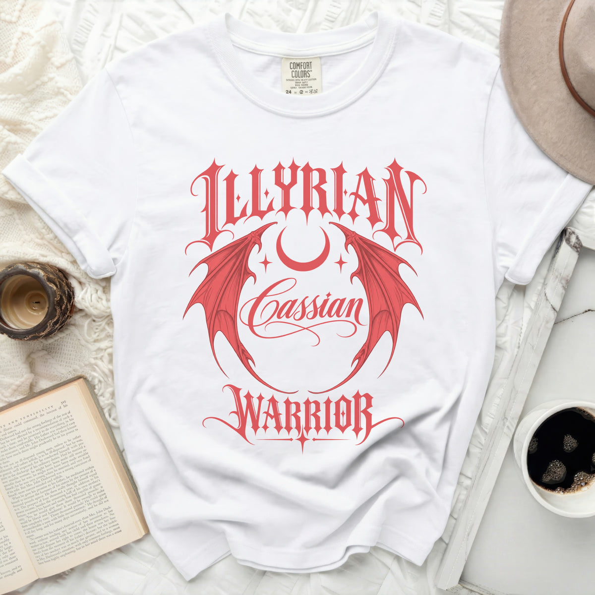 White t-shirt with red "Illyrian Cassian Warrior" text and wings design.