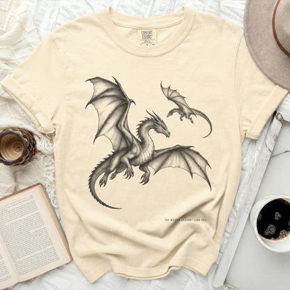 Cream t-shirt with a charcoal sketch of two dragons and the text "YOU WANT A DRAGON? EARN ONE."