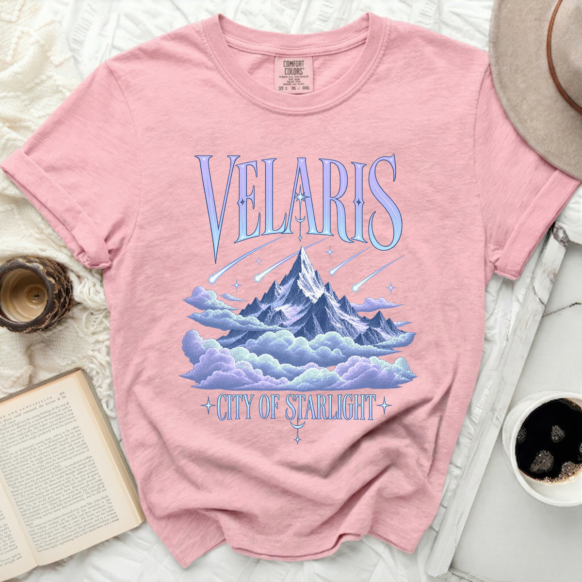 Pink t-shirt with "Velaris City of Starlight" text and mountain graphic.