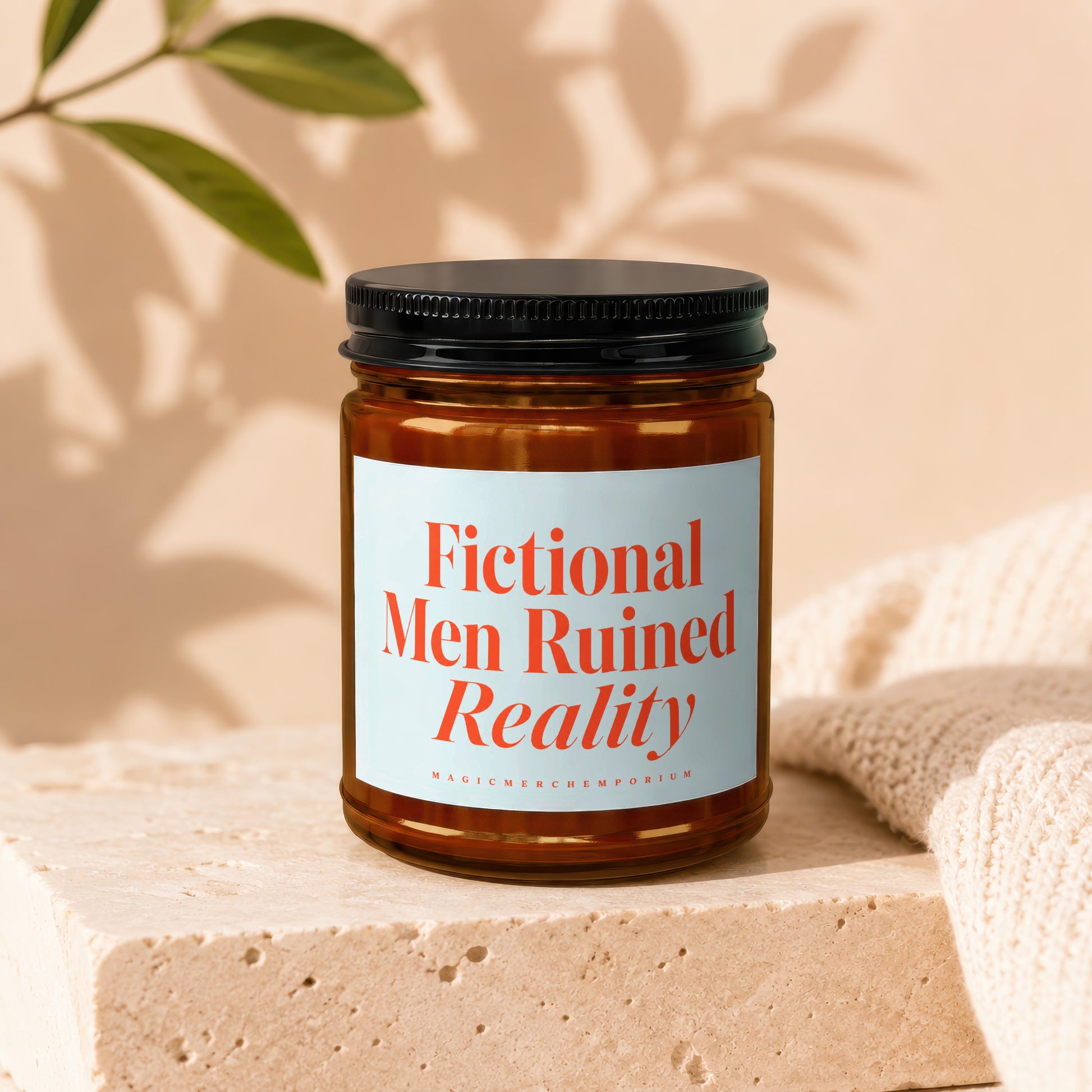 Brown glass candle with "Fictional Men Ruined Reality" text on label.