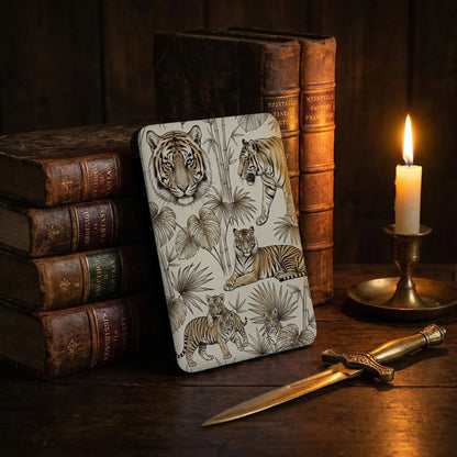 Device with tiger art, antique books, lit candle, and dagger.