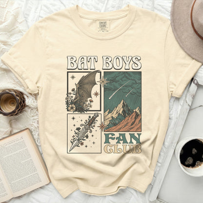 Cream t-shirt with "BAT BOYS FAN CLUB" graphic and stylized illustrations.