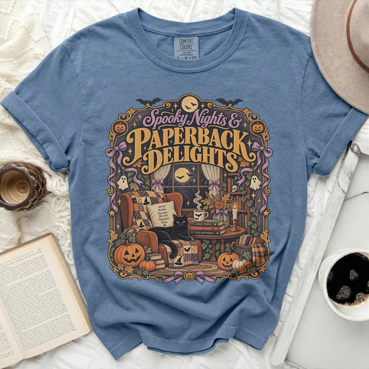 Comfort Colors blue t-shirt with "Spooky Nights & Paperback Delights" Halloween graphic.