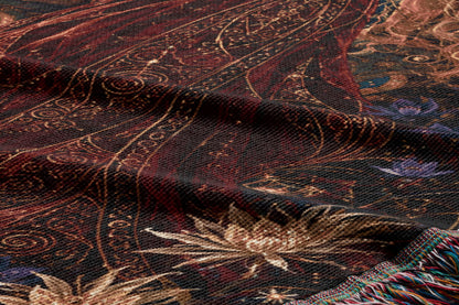 The image is a close-up view of a textured fabric with a floral pattern, featuring a mix of red, gold, and blue colors.