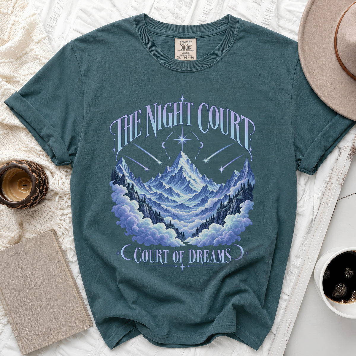 Teal t-shirt with "The Night Court" and "Court of Dreams" graphic of mountains and clouds.