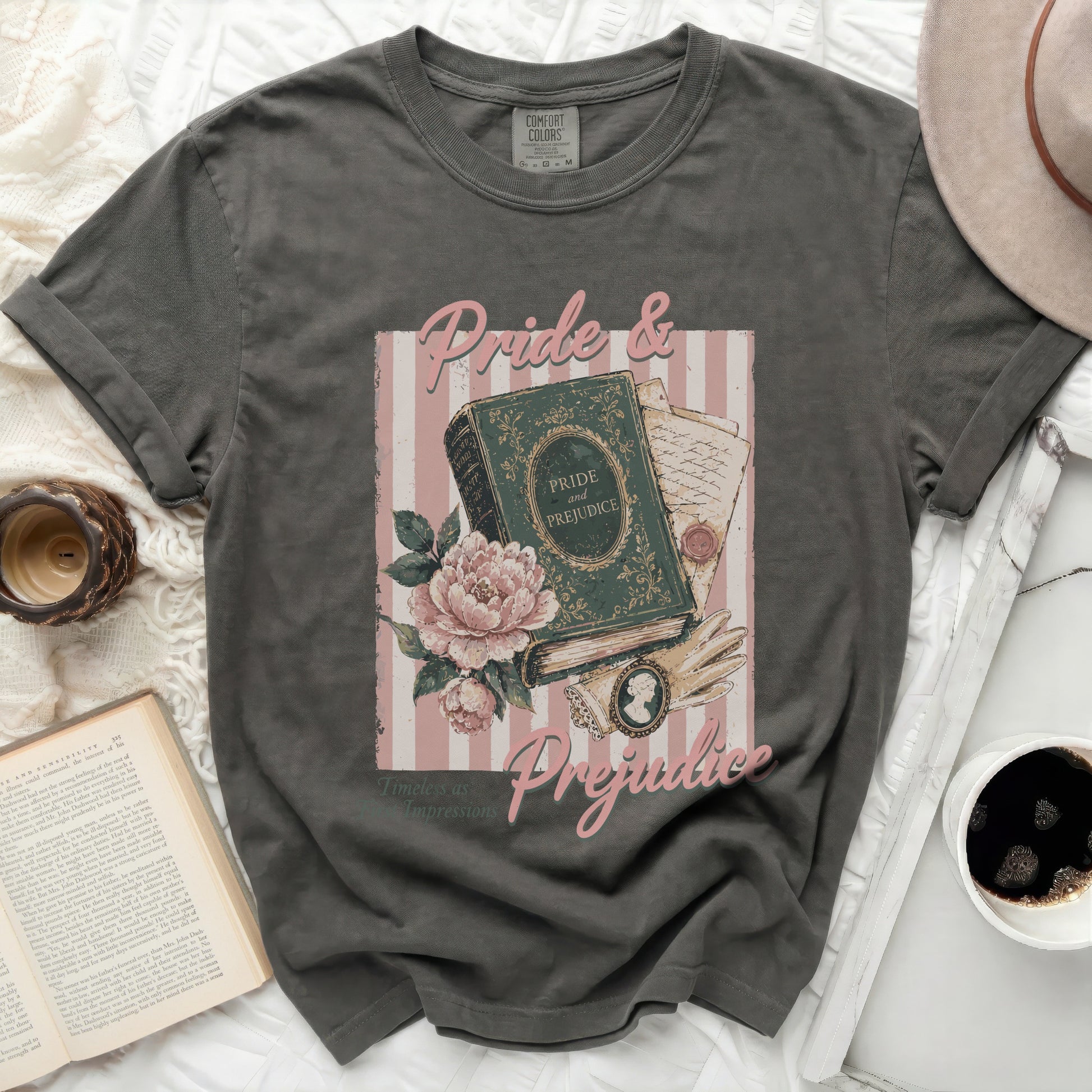 Dark grey t-shirt with "Pride & Prejudice" book graphic and flowers.