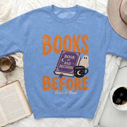 Light blue sweatshirt with "Books Before Bad Decisions" graphic.