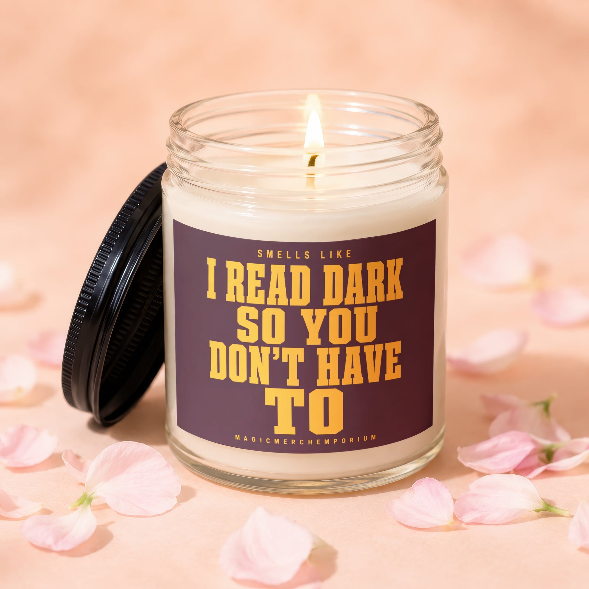 Candle with text "Smells like I read dark so you don't have to".