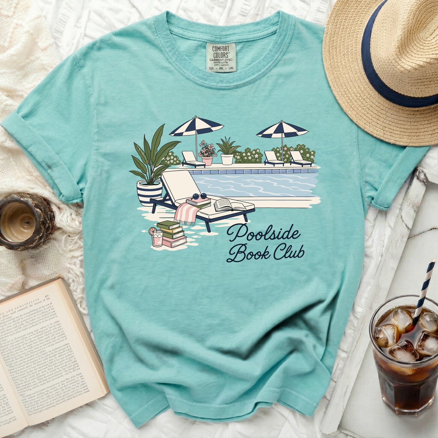 Teal t-shirt with "Poolside Book Club" text and swimming pool graphic.