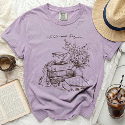 Purple t-shirt with "Pride and Prejudice" and literary sketch.