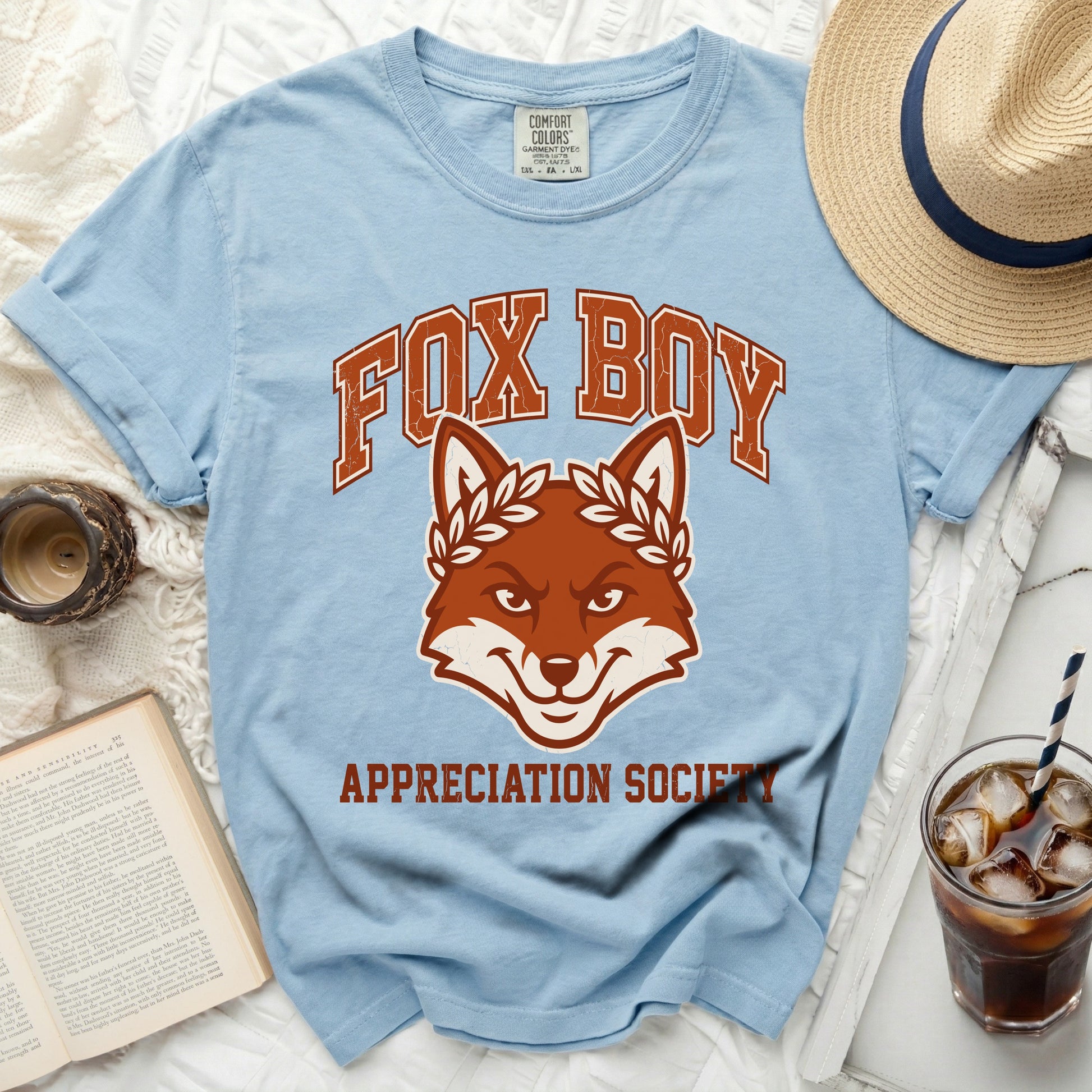 Light blue t-shirt with "FOX BOY APPRECIATION SOCIETY" graphic.