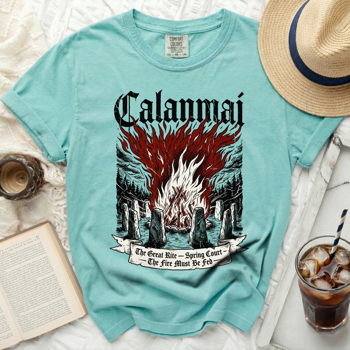 Teal t-shirt with "Calanmai" and a bonfire ritual graphic.