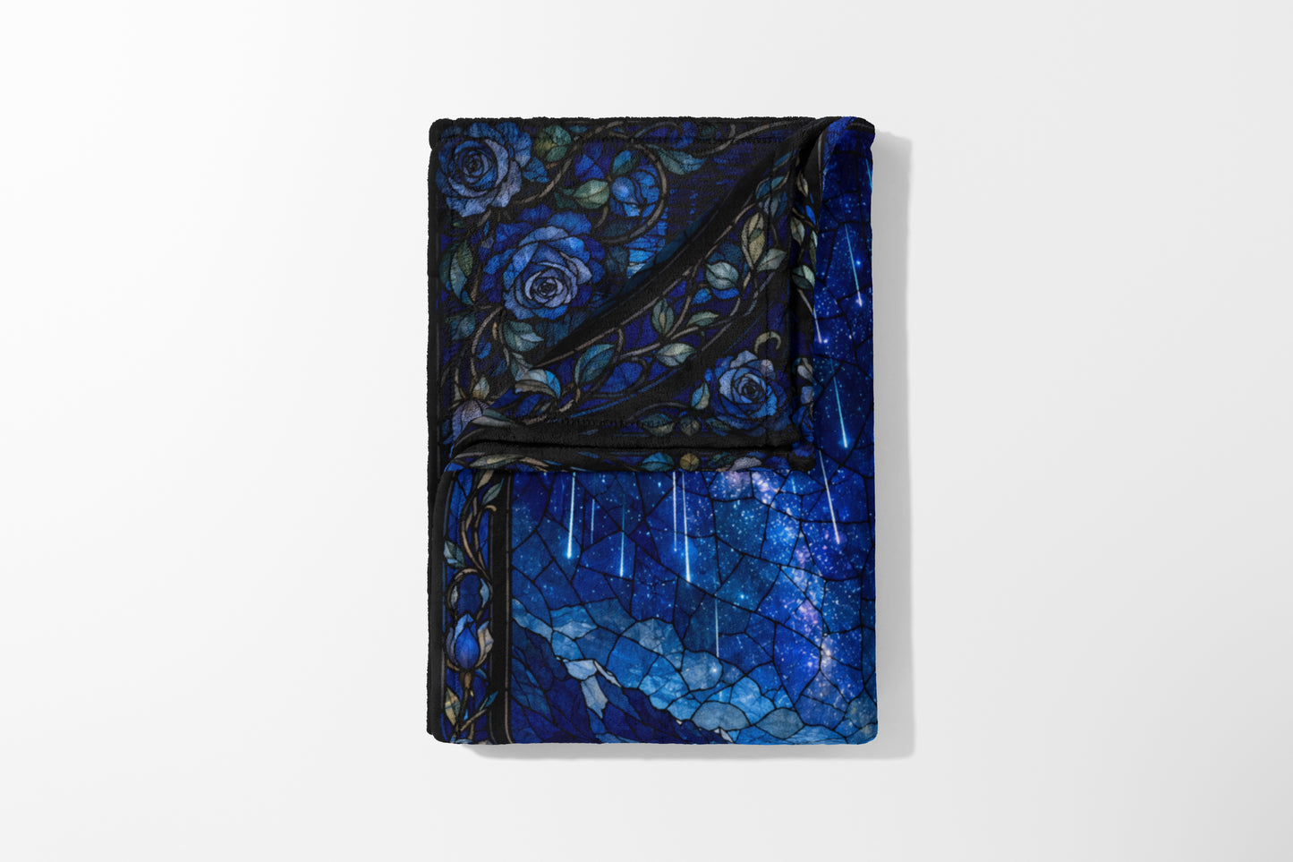 Fleece blanket with blue roses and starry sky stained glass design.