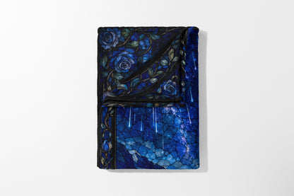 Fleece blanket with blue roses and starry sky stained glass design.