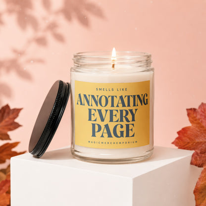 Glass candle with yellow label reading "Smells like Annotating Every Page"