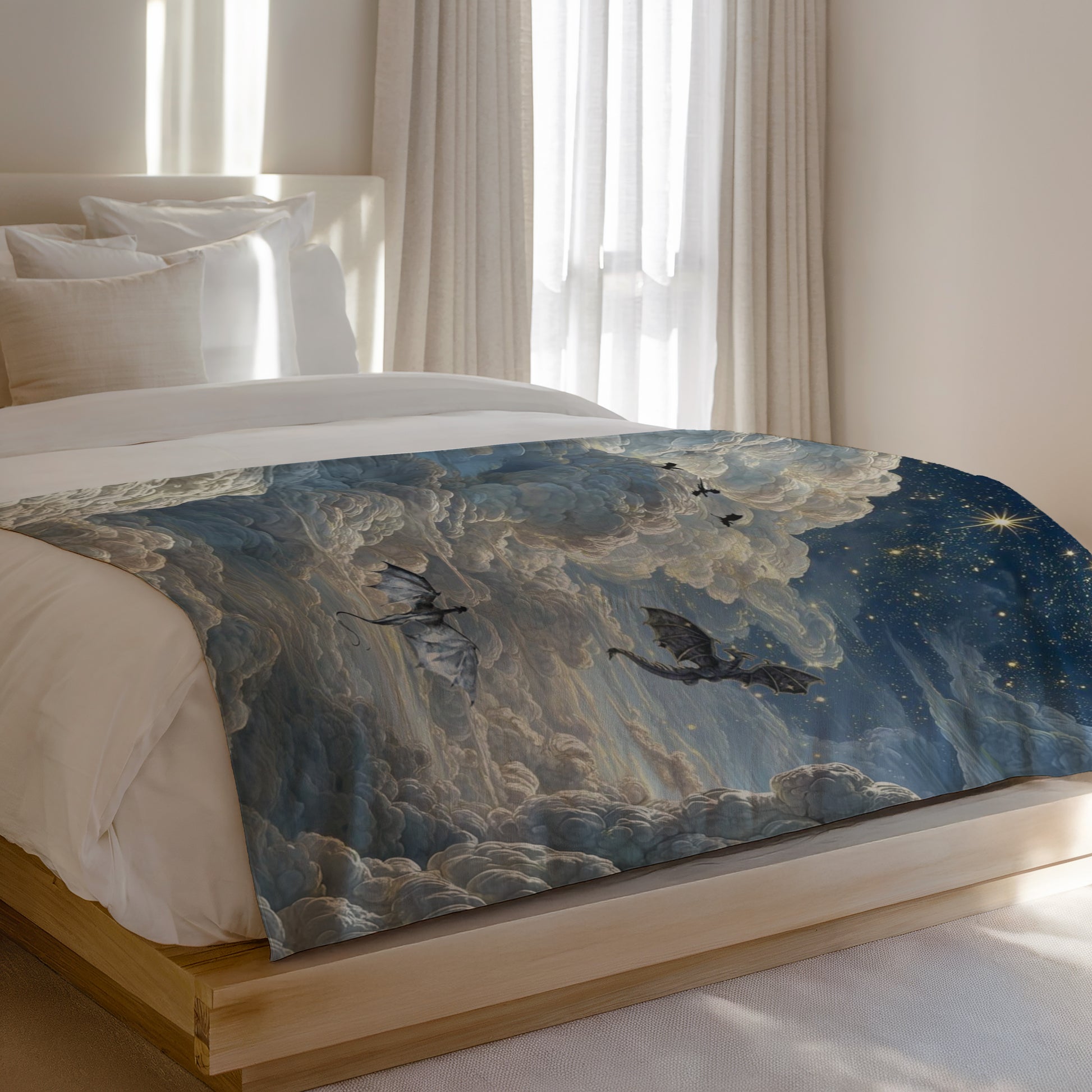 Dragons fly through a cloudy, starry night sky on a blanket on a bed.