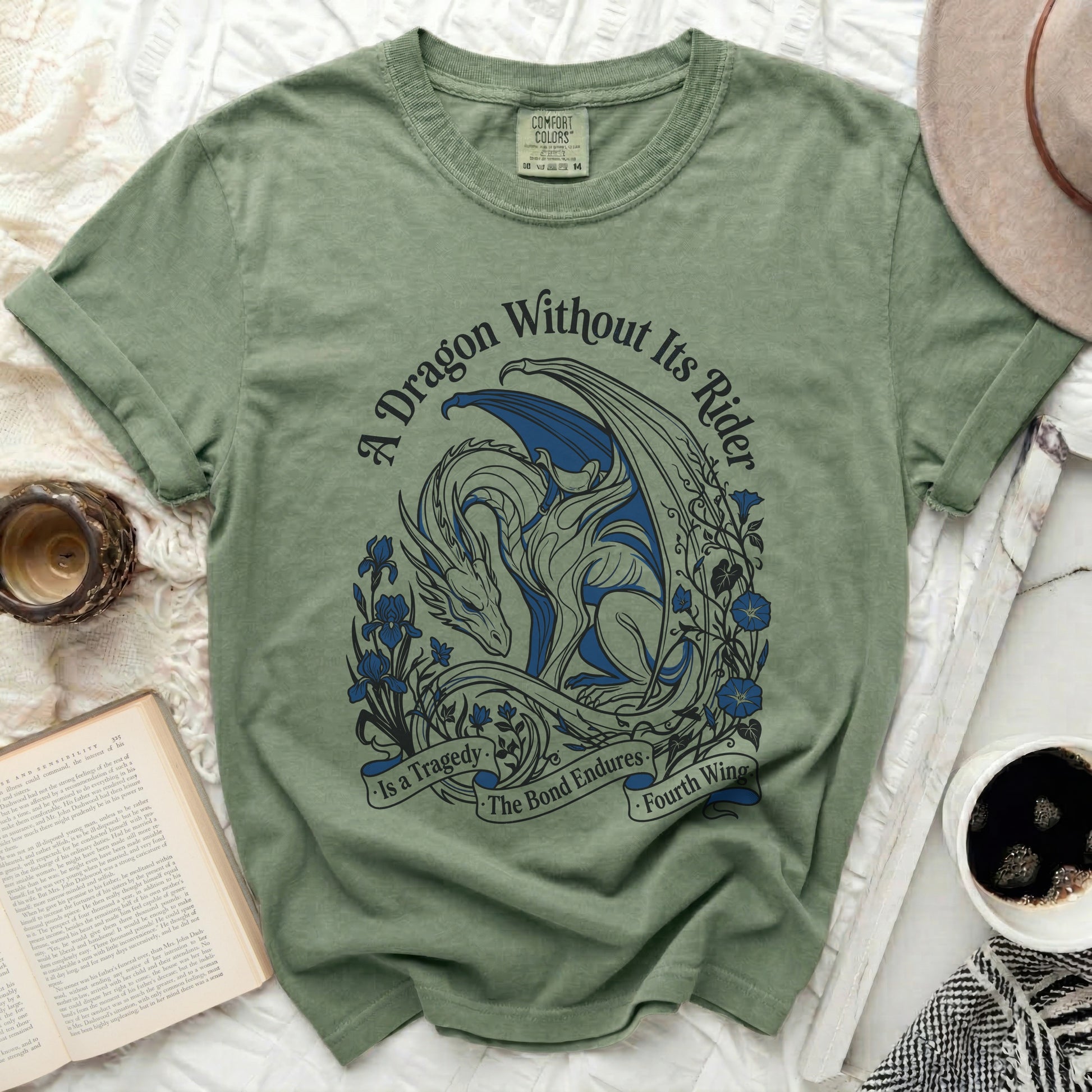 T-shirt with dragon graphic and text "A Dragon Without Its Rider is a Tragedy. The Bond Endures. Fourth Wing."