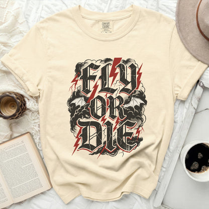 Cream t-shirt with "Fly or Die" text in distressed black font with red lightning.