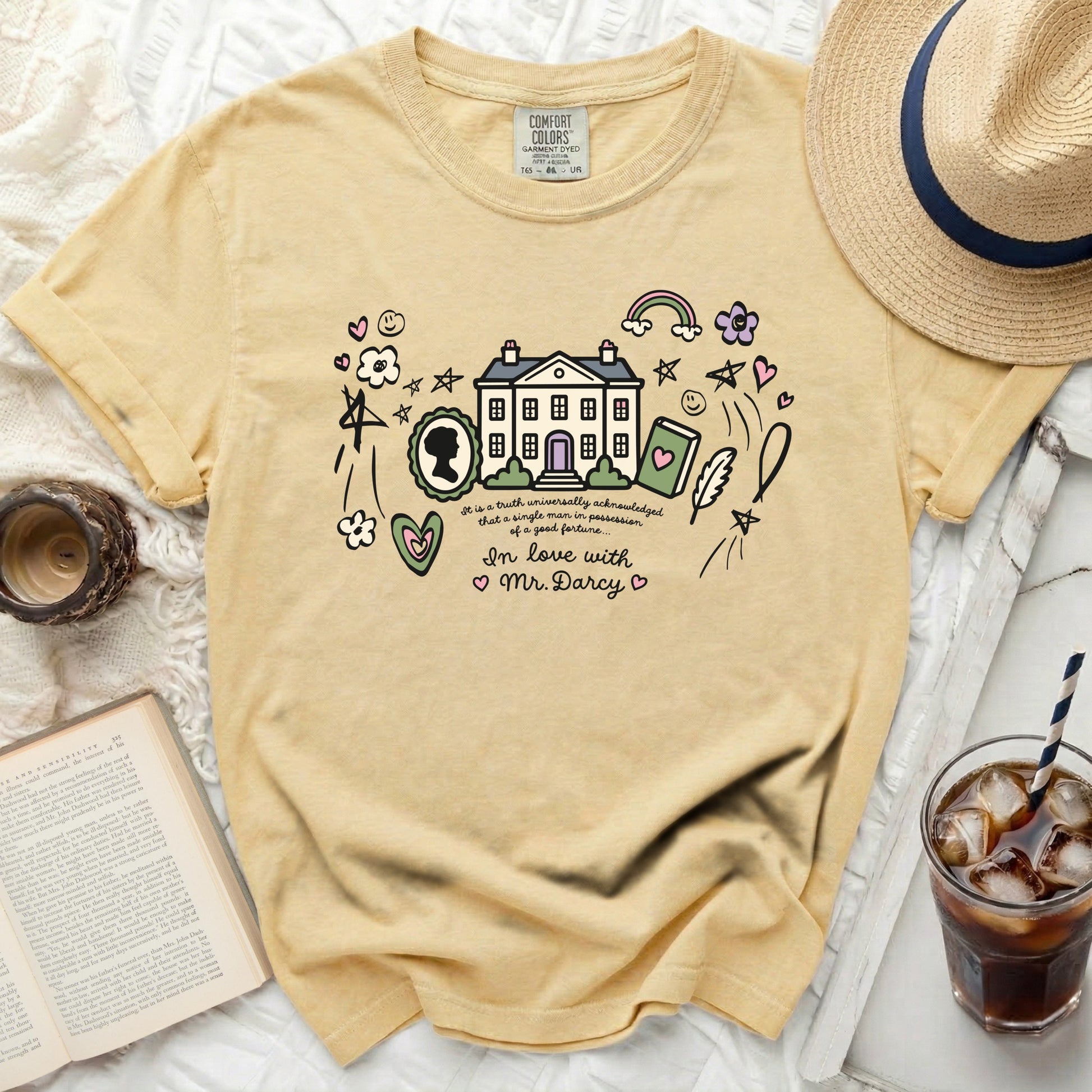 T-shirt with a house, silhouette, book, and text "In love with Mr. Darcy".