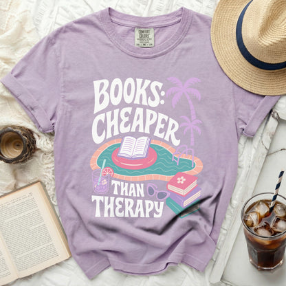 T-shirt with "Books: Cheaper Than Therapy" text and pool graphic.