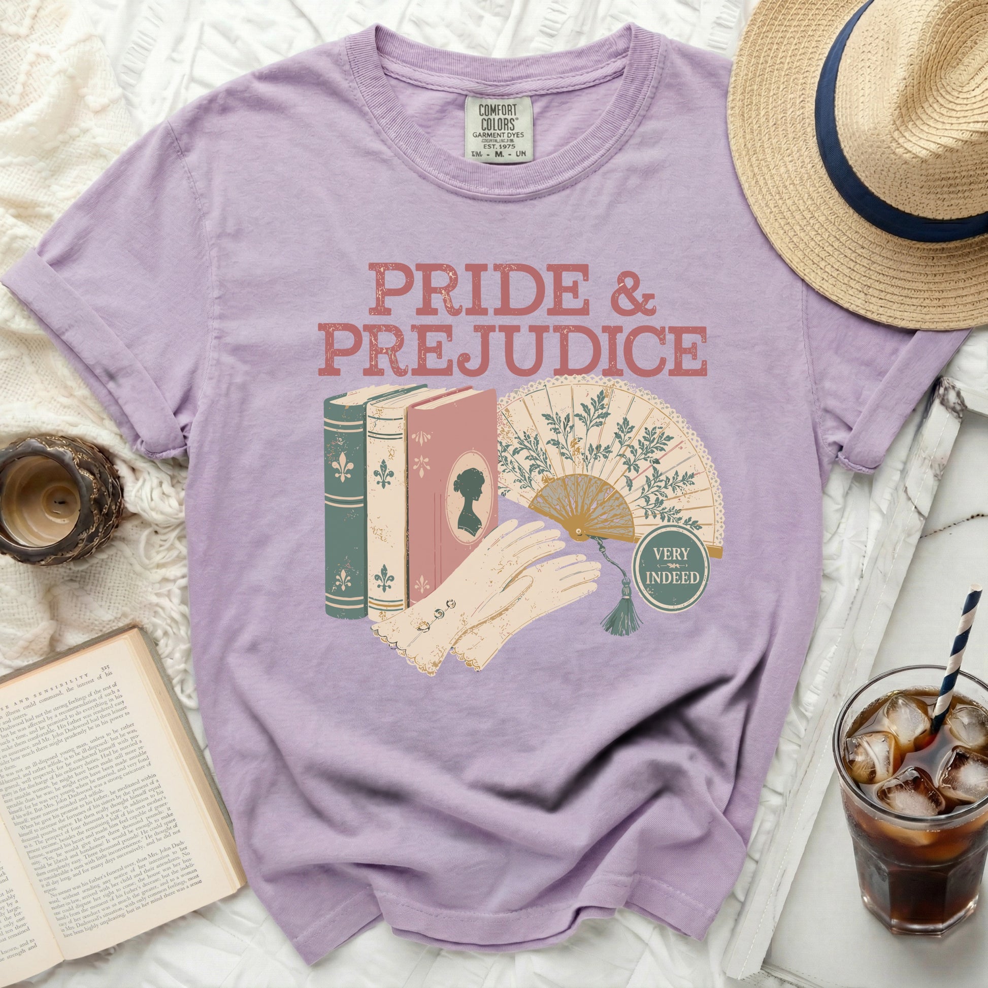 Pride & Prejudice graphic tee with books, fan, and gloves.