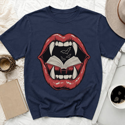 Dark t-shirt with graphic of red lips, fangs, open book, and bats.