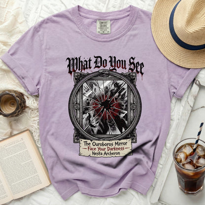 Purple t-shirt with "The Ouroboros Mirror - Face Your Darkness - Nesta Archeron" graphic.