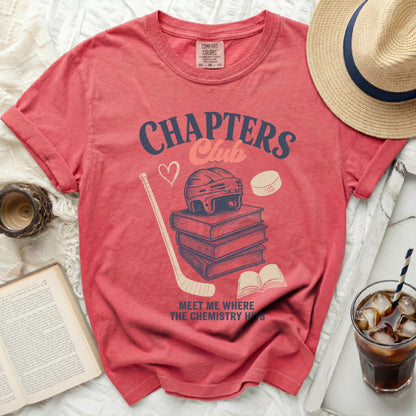 Coral t-shirt with "Chapters Club" and hockey graphics.