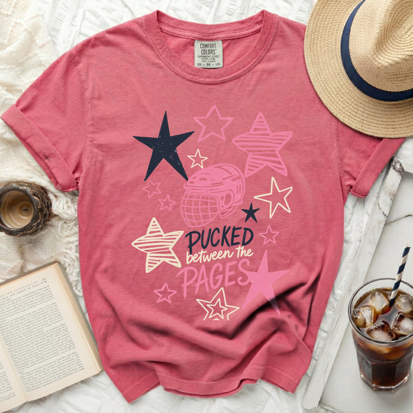 Pucked Between The Pages Tee in Crunchberry